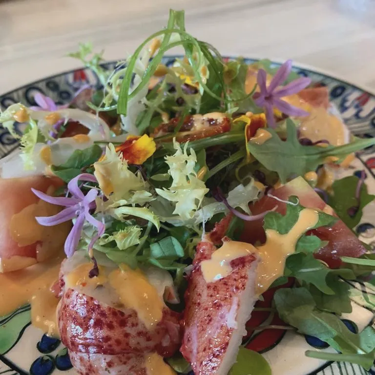 Lobster salad with wild herbs and edible flowers